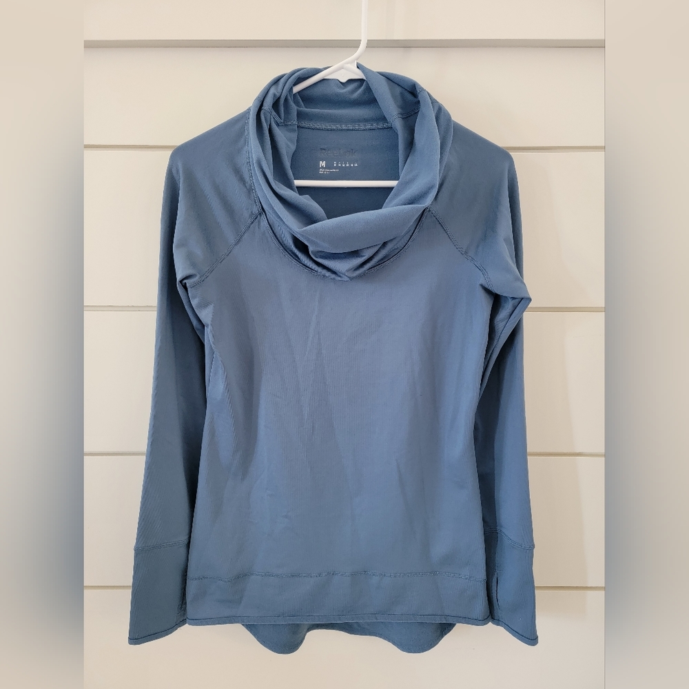 Women's Reebok cowel neck pullover sweatshirt in blue. Size Medium